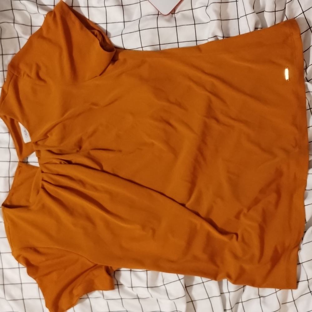 Orange Calvin Klein shirt